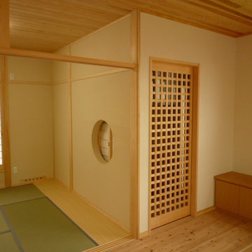 珪藻土と杉材で造った薪ストーブのある家