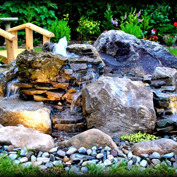 One-of-a-Kind Water Feature by Full Service Aquatics. Project site Chatham, NJ.