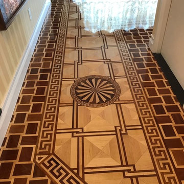 Decorative border frames the flooring much like a picture frame