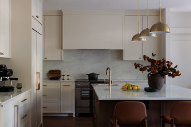 Inspiration for a transitional kitchen remodel in Vancouver with an island