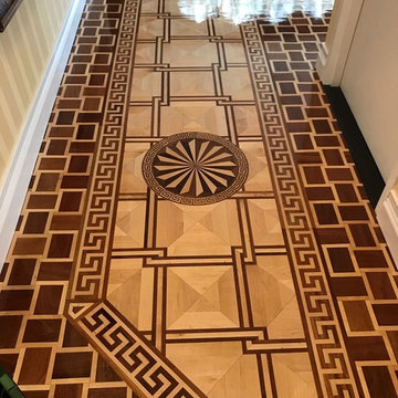 Decorative border frames the flooring much like a picture frame