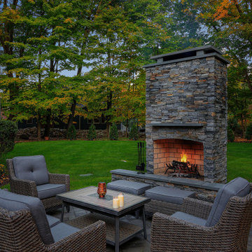 Make a Statement with a Versatile Outdoor Kitchen and Double Fire Feature