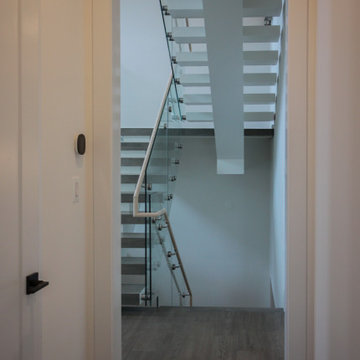 Project #80 | Mono-Beam Staircase with Glass Panels