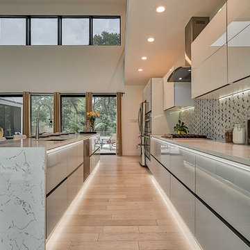 Modern kitchen cabinets with Glass facades in North Dallas