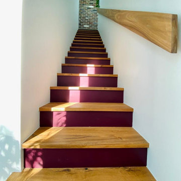 Maroubra Duplex - Spotted gum stair with plum risers