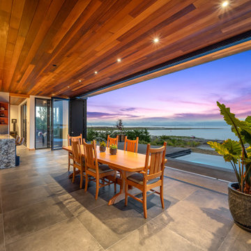 Oceanfront Home Captures Nature’s Drama with NanaWall Stacking Glass Doors