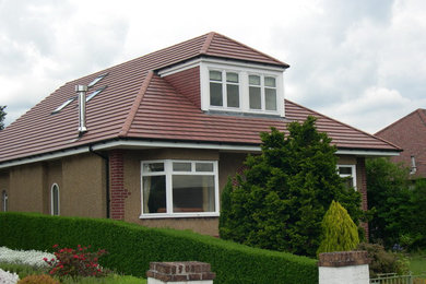 Photo of an expansive contemporary home in Glasgow.