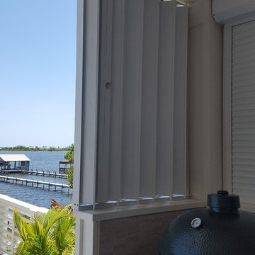 Bellare Motorized Rolling Shutter & Side Accordion Around Outdoor Kitchen