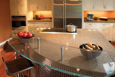Inspiration for a mid-sized contemporary l-shaped medium tone wood floor eat-in kitchen remodel in Miami with beaded inset cabinets, white cabinets, quartz countertops, stainless steel appliances and an island