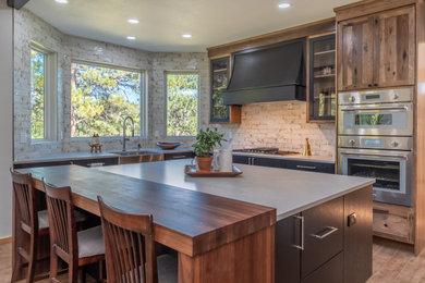 Example of a mountain style kitchen design in Denver
