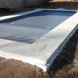 Reclaimed Granite Used as Pool Coping - Landscaping Stones And Pavers