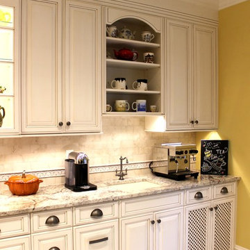Traditional Mediterranean Off White Kitchen with custom lattice door insert cabi