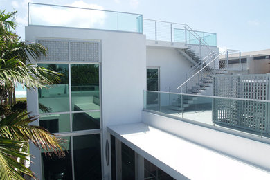 This is an example of a contemporary home design in Miami.