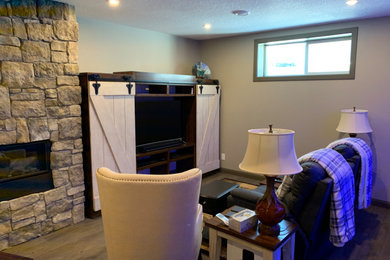 Arts and crafts basement photo in Calgary