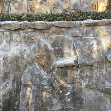 Stone wall repair, West Fort Worth.