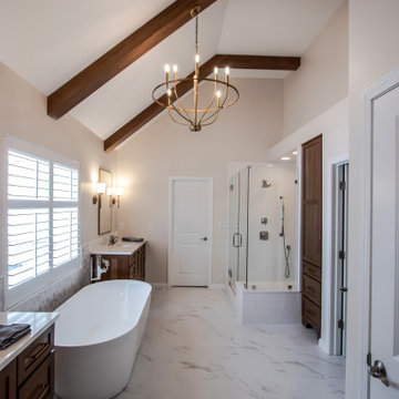Luxury Spa Bathroom with Natural Warm Vanities, Quartz Countertop, Tiled Shower