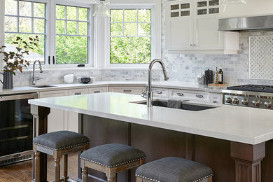 Example of a transitional kitchen design in Toronto