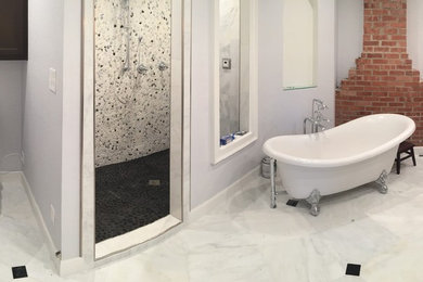 Mid-sized transitional kids' pebble tile marble floor and white floor bathroom photo in Orange County with shaker cabinets, dark wood cabinets, a one-piece toilet, gray walls, an undermount sink and marble countertops