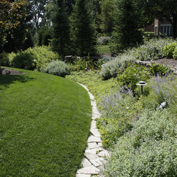 Full Landscape with Patio, Outdoor Kitchen, Stone Driveway and Planting