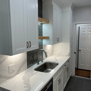 Kitchen Remodeling in Washington DC with white quartz and full-height backsplash
