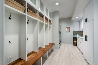 Inspiration for a transitional laundry room in Denver.