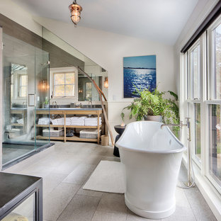 Example of a large country master porcelain floor and gray floor bathroom design in Burlington with open cabinets, light wood cabinets, zinc countertops, a hinged shower door, gray walls and an undermount sink