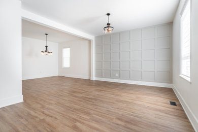 Family room - large country open concept wainscoting family room idea in Toronto