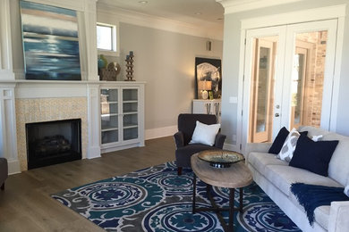 Example of a mid-sized transitional enclosed living room design in Other with gray walls