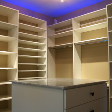 Elegant His & Her Closets | SpaceManager Closets