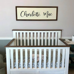 white crib with wood trim