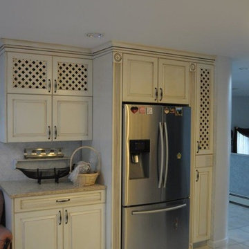 Traditional Antique Ivory/Walnut Two Tone Solid-wood kitchen.