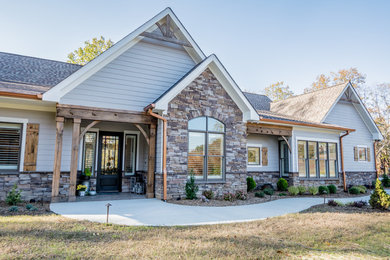 Large craftsman gray one-story concrete fiberboard exterior home idea in Nashville with a mixed material roof