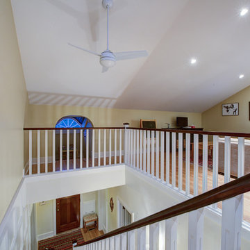 Trendy Attic Development in a 1926 Home