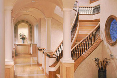 This is an example of a mediterranean hallway in Denver with beige walls.