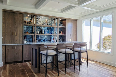 Danish galley wet bar photo in Cleveland with an undermount sink, flat-panel cabinets, gray cabinets and quartzite countertops