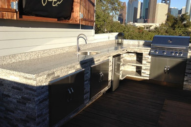 Patio - contemporary patio idea in Houston