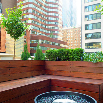 Rooftop Garden with Pergola and Fencing for Outdoor Seating Area