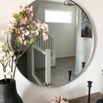 Frame My Mirror - Cheyenne Framed Round Mirror, Nickel - Sleek, modern, beautiful. This gorgeous mirror is sure to dazzle with its high-quality design and ease of installation. 30&Prime;W x 30&Prime;H x 1.5&Prime;D. Hanging hardware (d-rings) installed for quick installation. Screws/anchors included. Felt backer applied to prevent unwanted marks on wall. 1.5&Prime; frame depth with a high-quality metallic, brushed nickel finish. Approved for high-moisture areas such as bathrooms. Rust proof MDF frame.