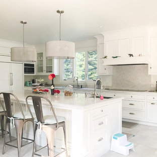 Traditional kitchen pantry in San Francisco with stainless steel appliances and white benchtop.