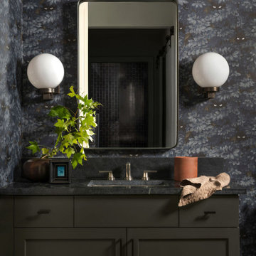 Moody Guest Bathroom with Floral Wallpaper, Dark Vanity & Brass Fixtures