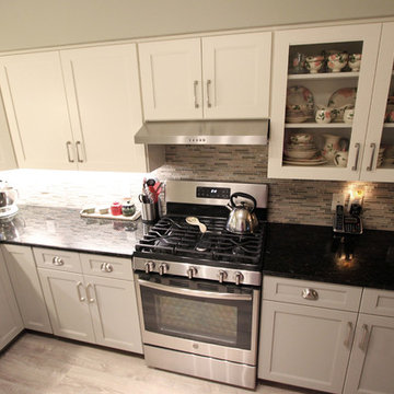 Refaced 2-tone kitchen, Base Cabinets - Harbor Mist; Wall Cabinets - Divinity