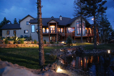 Inspiration for a transitional exterior home remodel in Albuquerque