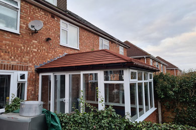 Warm Roof conservatory with double sliding Doors