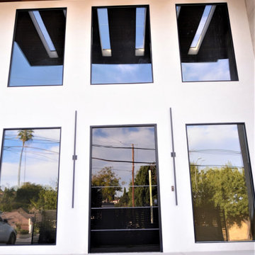 Custom Frameless Black Laminated Glass Oversized Pivot Door