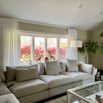 Pair of White Linen Ripple Fold Drapery Panels on Kirsch Rod in Living Room