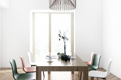 Idée de décoration pour une salle à manger nordique fermée et de taille moyenne avec un mur blanc, un sol en bois brun et aucune cheminée.