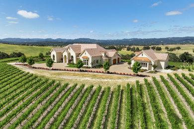 Inspiration for a french country exterior home remodel in San Luis Obispo