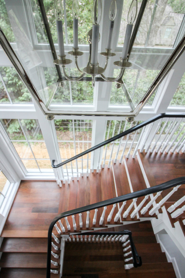 Powerful Impression by Floating Staircase in Suburban Foyer