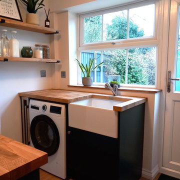 Green and oak utility room