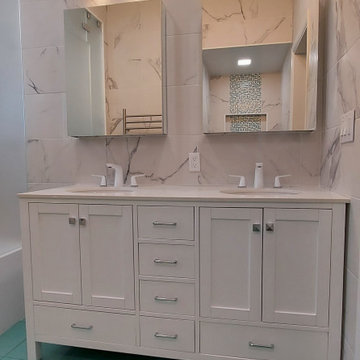 Home SPA bathroom with steamer and double vanity.